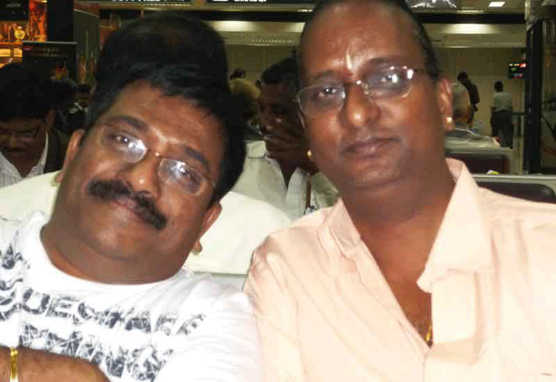 With Music Director Sharreth